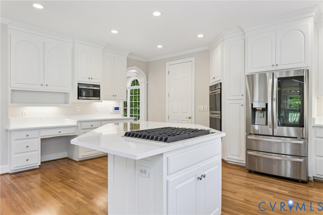 3009 Travis Pond Road Williamsburg, VA 23185 - Photo 36 of 100 Gourmet kitchen featuring a central island with a