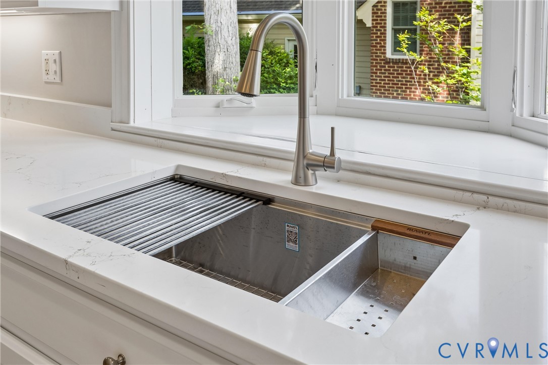 3009 Travis Pond Road Williamsburg, VA 23185 - Photo 38 of 100 Integrated stainless steel workstation sink with a