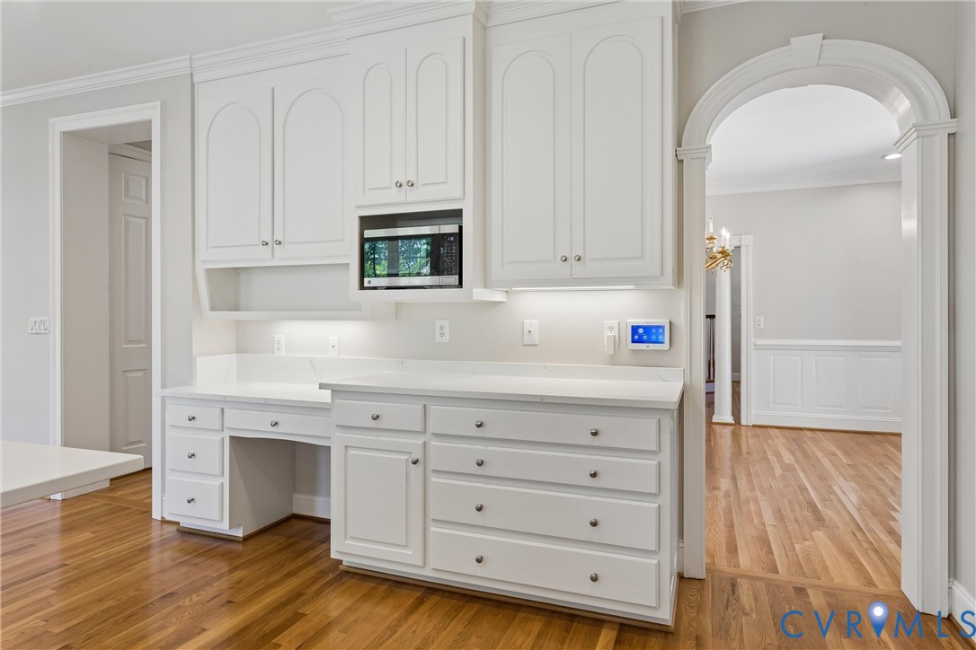 3009 Travis Pond Road Williamsburg, VA 23185 - Photo 39 of 100 Built-in white cabinetry with a dedicated desk are