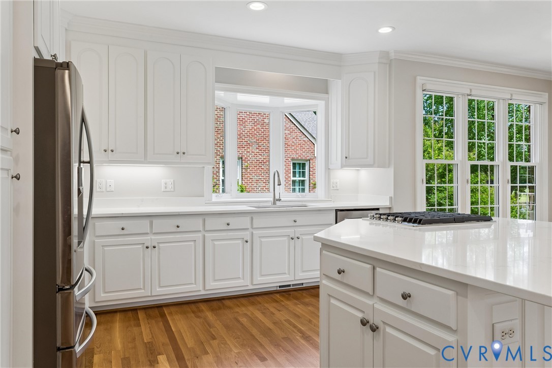 3009 Travis Pond Road Williamsburg, VA 23185 - Photo 40 of 100 Bright kitchen featuring white cabinetry, light-to