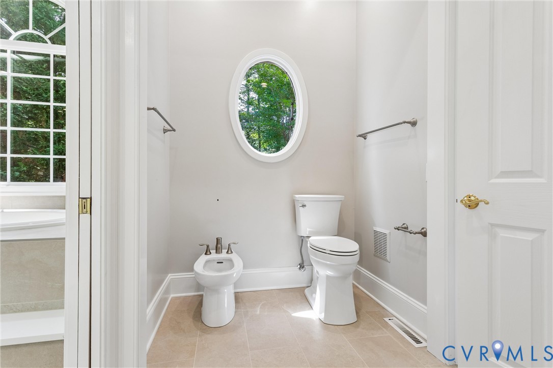 3009 Travis Pond Road Williamsburg, VA 23185 - Photo 49 of 100 Well-appointed water closet featuring a contempora