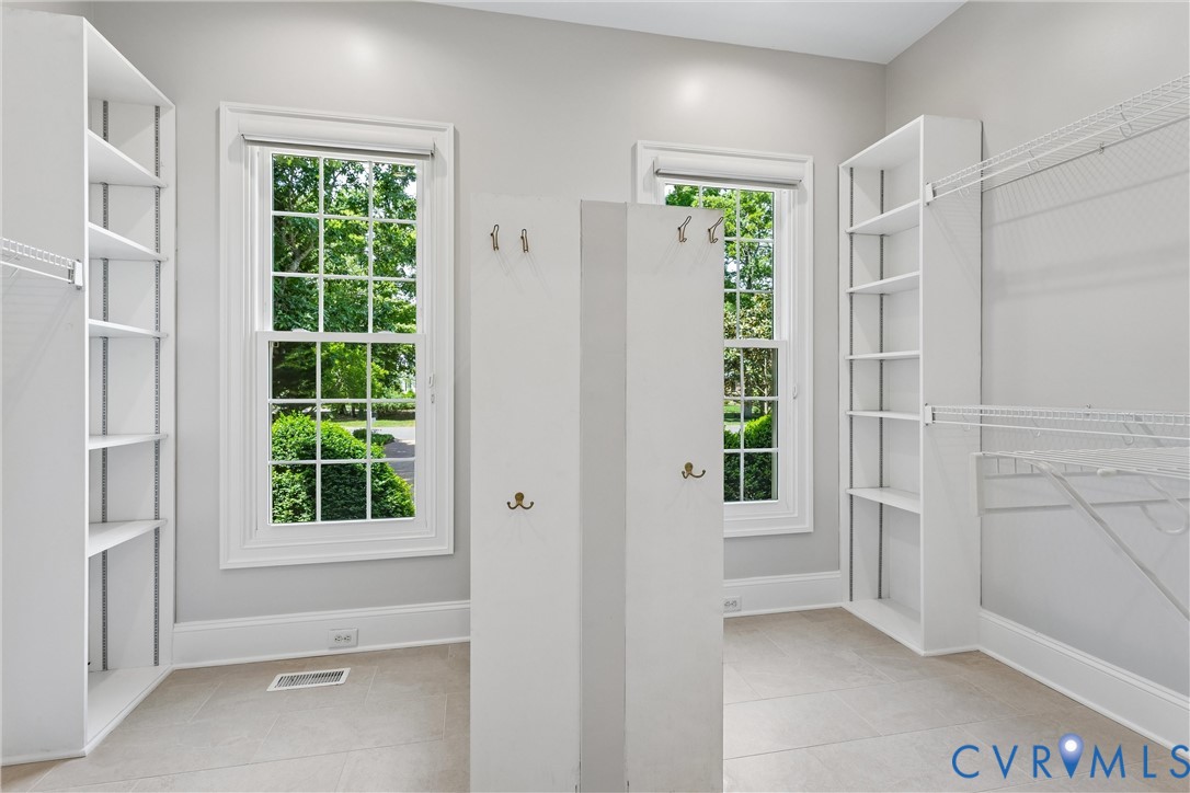 3009 Travis Pond Road Williamsburg, VA 23185 - Photo 53 of 100 Spacious room featuring light gray walls and tiled
