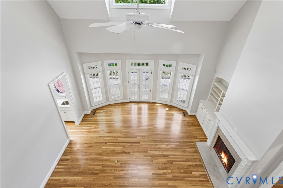 3009 Travis Pond Road Williamsburg, VA 23185 - Photo 54 of 100 Spacious living area featuring wood-finish floorin