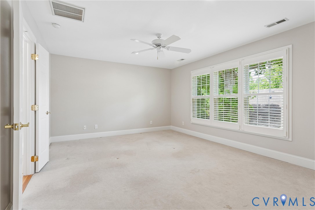 3009 Travis Pond Road Williamsburg, VA 23185 - Photo 59 of 100 Spacious room featuring light neutral wall paint,