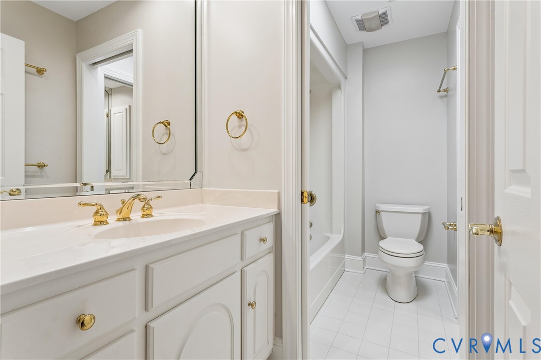 3009 Travis Pond Road Williamsburg, VA 23185 - Photo 60 of 100 Bathroom featuring a single vanity with gold-tone