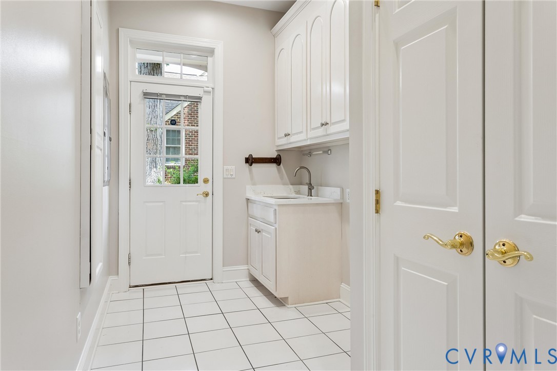 3009 Travis Pond Road Williamsburg, VA 23185 - Photo 66 of 100 Utility space featuring a white paneled door with