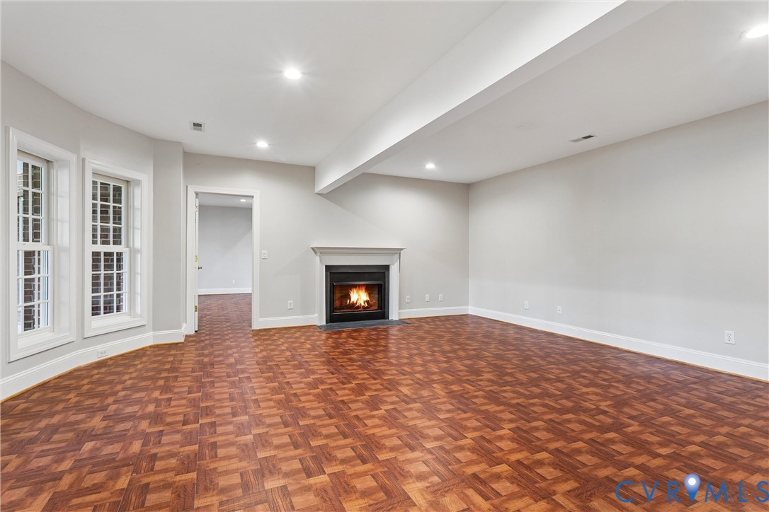 3009 Travis Pond Road Williamsburg, VA 23185 - Photo 67 of 100 Spacious room featuring wood-finish parquet floori