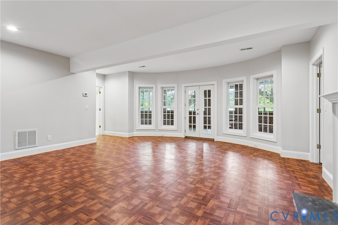 3009 Travis Pond Road Williamsburg, VA 23185 - Photo 68 of 100 Spacious interior room featuring wood parquet floo