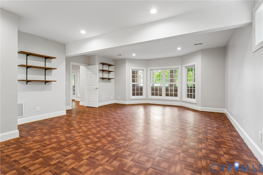 3009 Travis Pond Road Williamsburg, VA 23185 - Photo 69 of 100 Spacious room with parquet wood-finish flooring