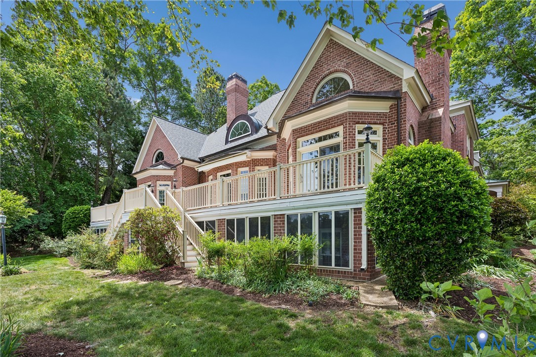 3009 Travis Pond Road Williamsburg, VA 23185 - Photo 76 of 100 Brick exterior featuring multiple gables and a mul