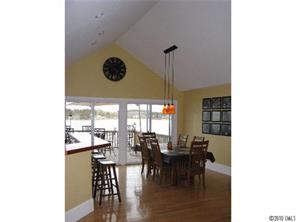 2069 Marquesas Avenue Tega Cay, SC 29708 - Photo 11 of 16 a view of a dining room with furniture and window
