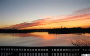 2069 Marquesas Avenue Tega Cay, SC 29708 - Photo 7 of 16 a view of lake with sunset