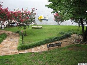 2069 Marquesas Avenue Tega Cay, SC 29708 - Photo 8 of 16 a park view with a bench