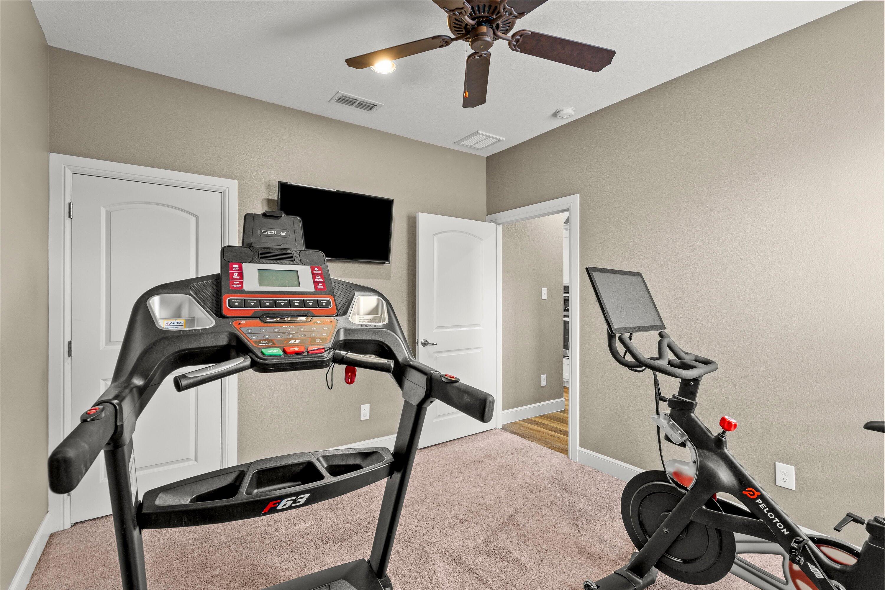 7033 101st Street Lubbock, TX 79424 - Photo 29 of 38 a view of a room with gym equipment