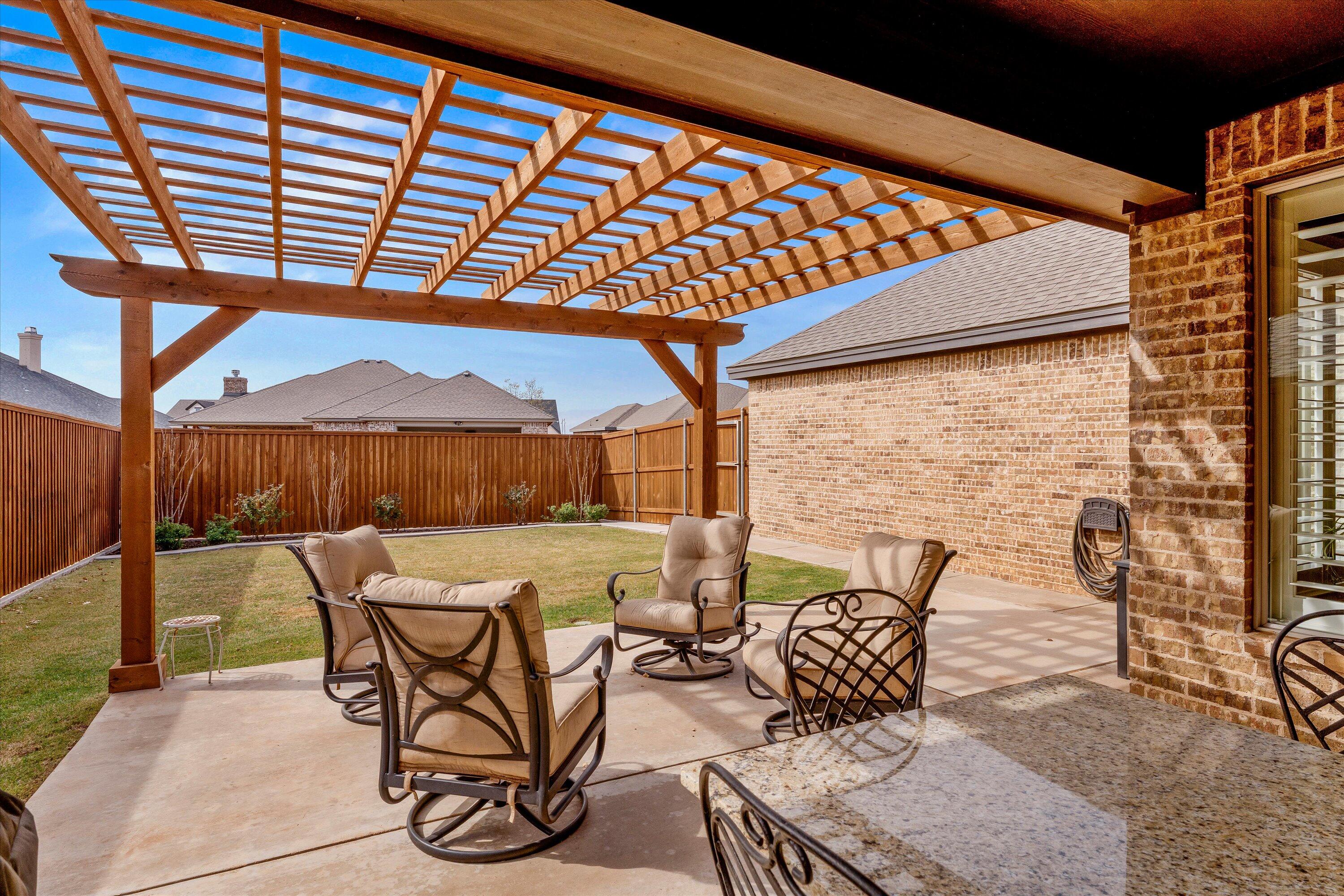 7033 101st Street Lubbock, TX 79424 - Photo 33 of 38 a view of outdoor space with seating