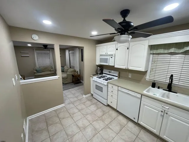a room with furniture and wooden floor