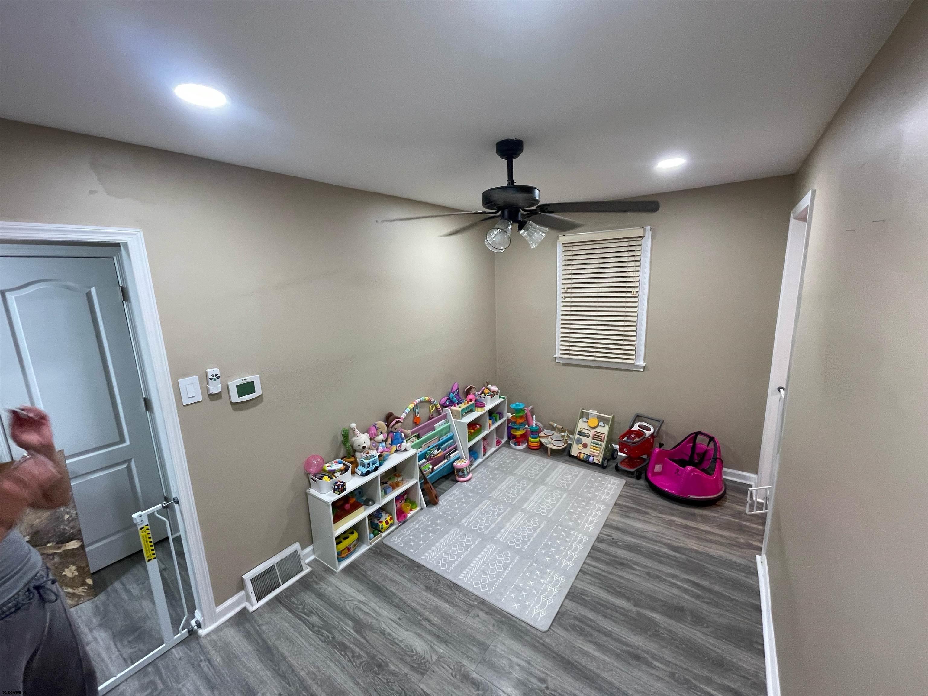 241 Warren Avenue Bellmawr, NJ 08031 - Photo 12 of 26 a room with furniture and wooden floor