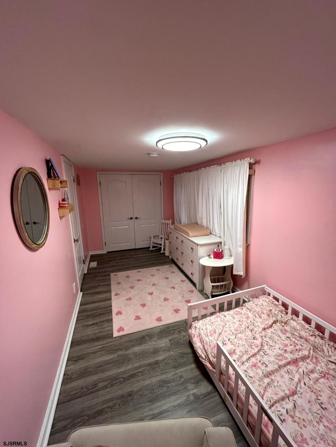 241 Warren Avenue Bellmawr, NJ 08031 - Photo 19 of 26 a bedroom with bed and balcony