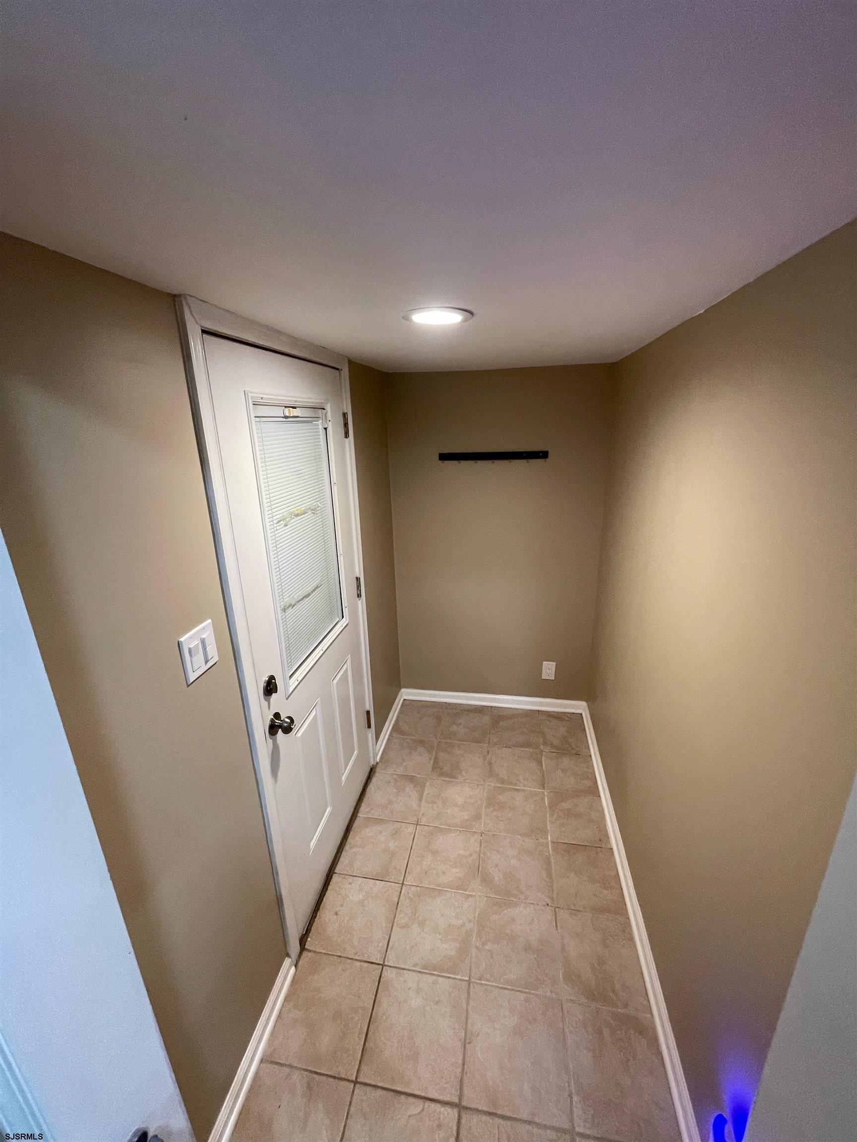 241 Warren Avenue Bellmawr, NJ 08031 - Photo 21 of 26 a view of hallway with stairs