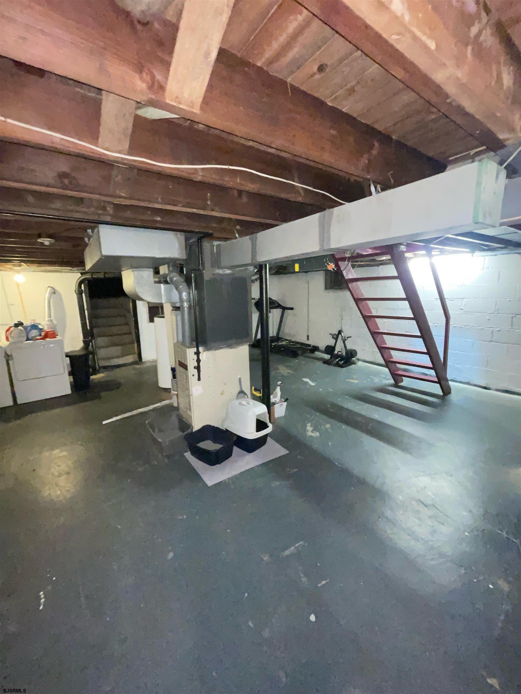 241 Warren Avenue Bellmawr, NJ 08031 - Photo 23 of 26 a view of a room with gym equipment