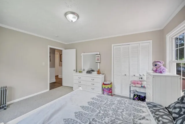 a bathroom with a shower toilet and sink