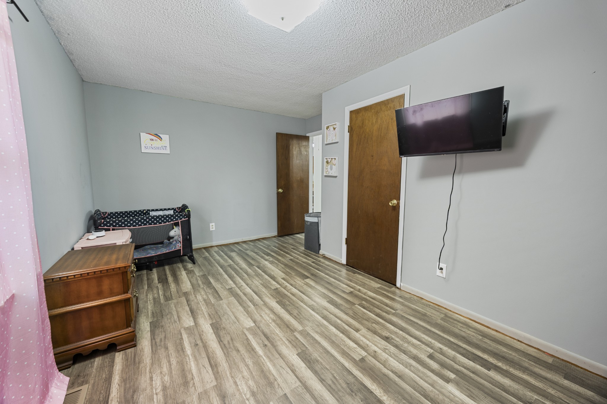 421 Shady Grove Road Flintville, TN 37335 - Photo 11 of 33 a bed room with a bed and television