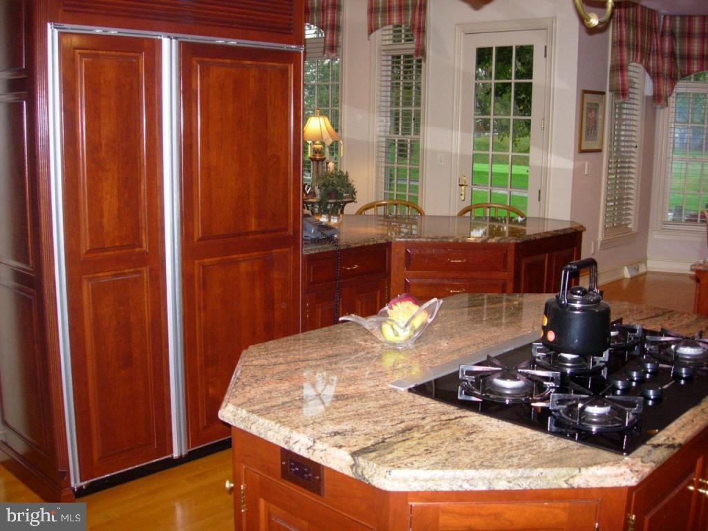 38 Oakhill Drive Lititz, PA 17543 - Photo 13 of 37 a table with wine bottles and glass windows