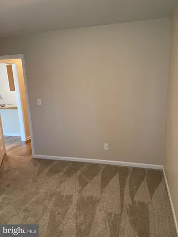 a white bath tub and a shower