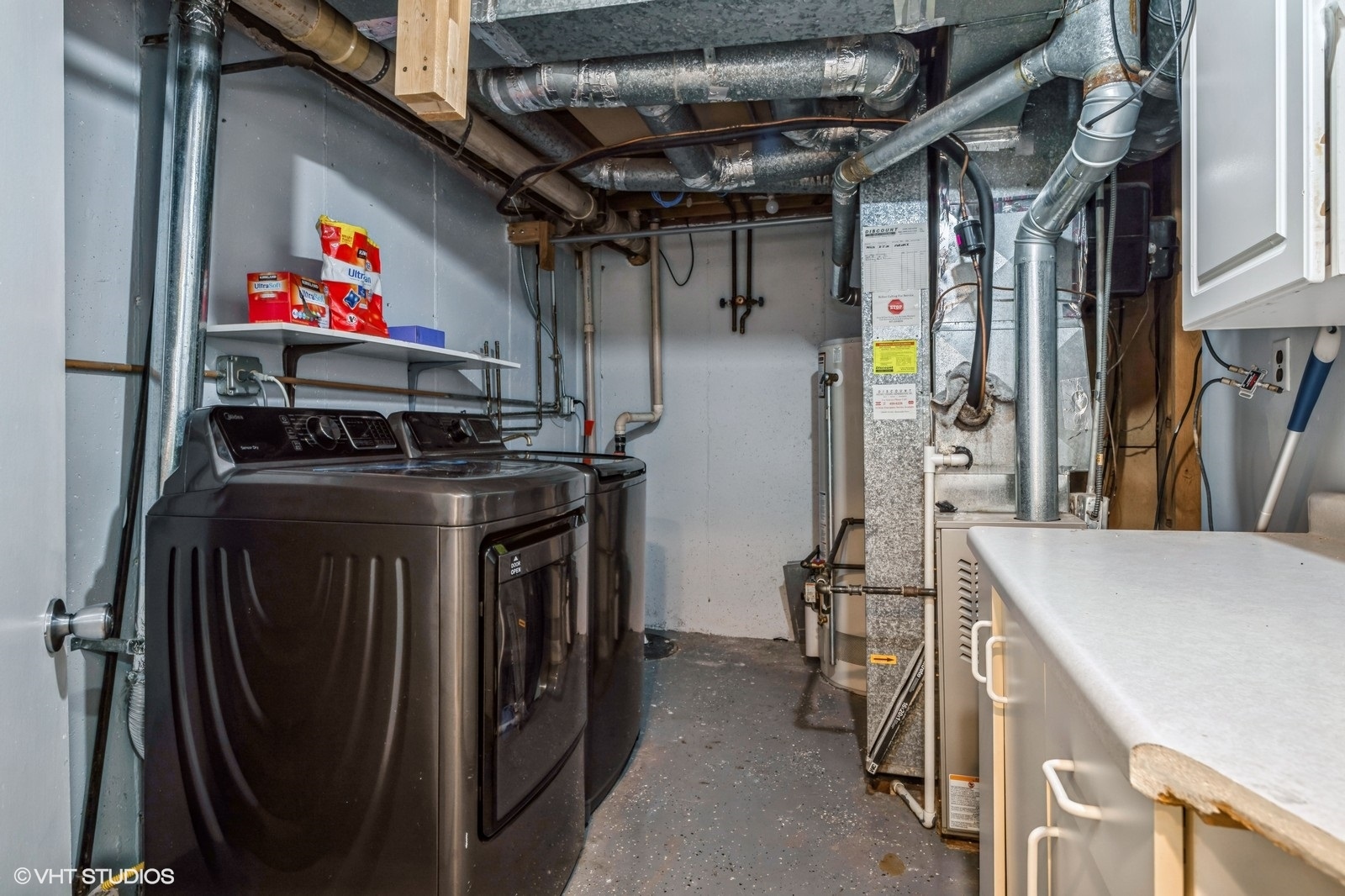1138 Inverrary Lane Deerfield, IL 60015 - Photo 11 of 12 a utility room with dryer and washer