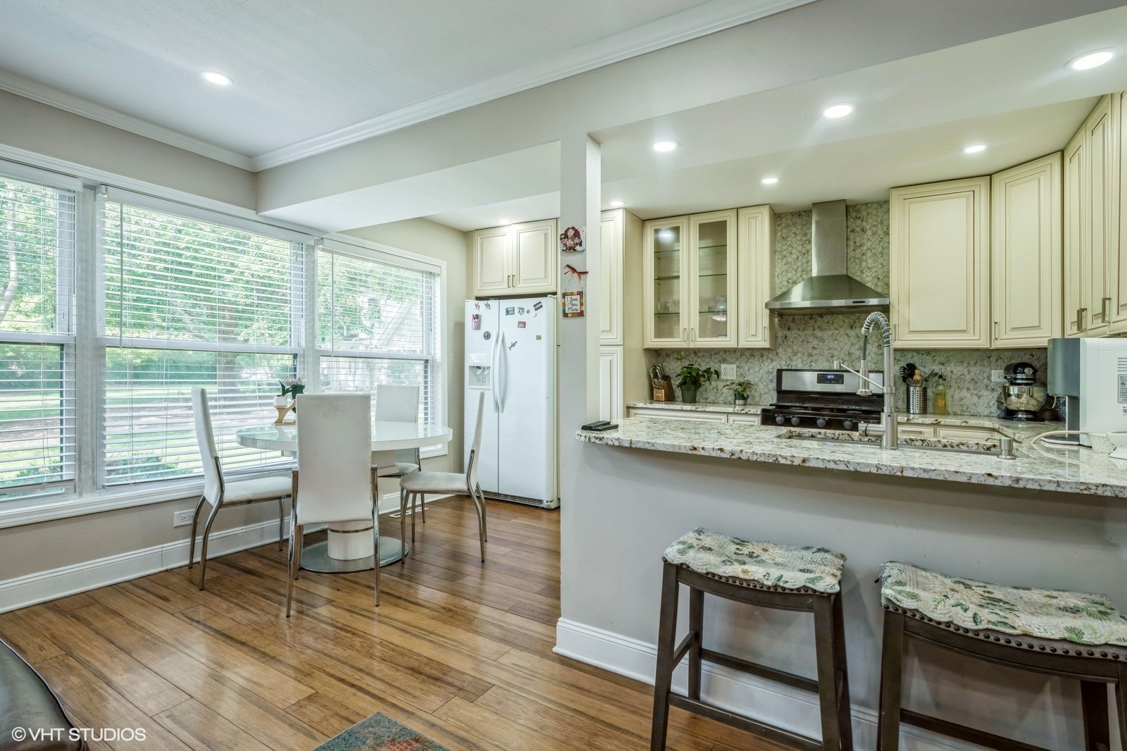 1138 Inverrary Lane Deerfield, IL 60015 - Photo 6 of 12 a dining room with furniture and wooden floor