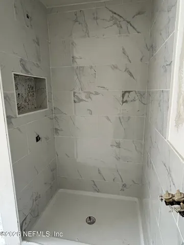 a view of a window and tree