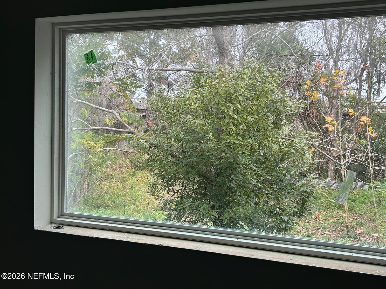 9959 Lem Turner Road Jacksonville, FL 32208 - Photo 2 of 22 a view of a room with a large window