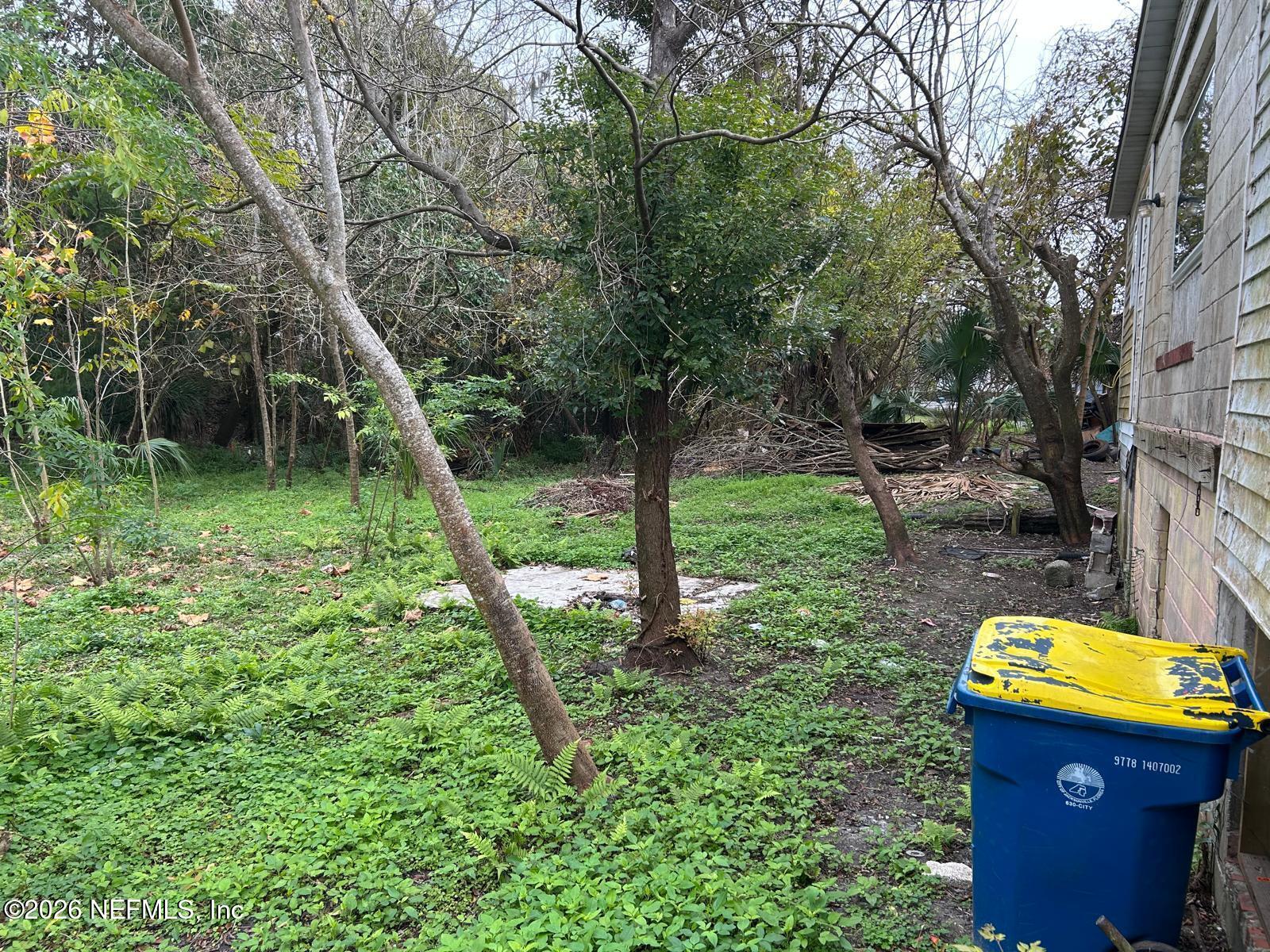 9959 Lem Turner Road Jacksonville, FL 32208 - Photo 22 of 22 a view of a back yard