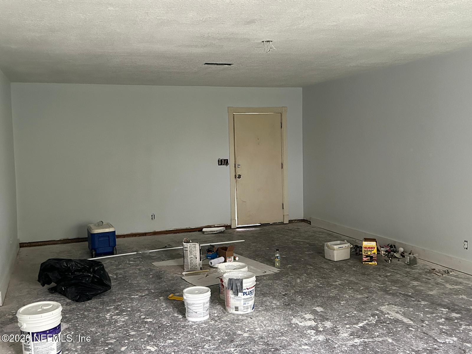 9959 Lem Turner Road Jacksonville, FL 32208 - Photo 3 of 22 a bathroom with a sink and a toilet