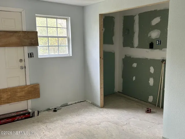 an empty room with a window