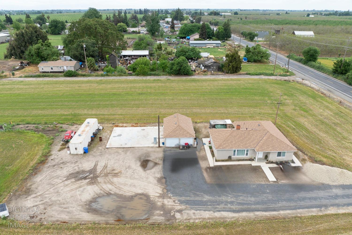 8712 Yosemite Boulevard Modesto, CA 95357 - Photo 2 of 24 a view of a lake in middle of the town