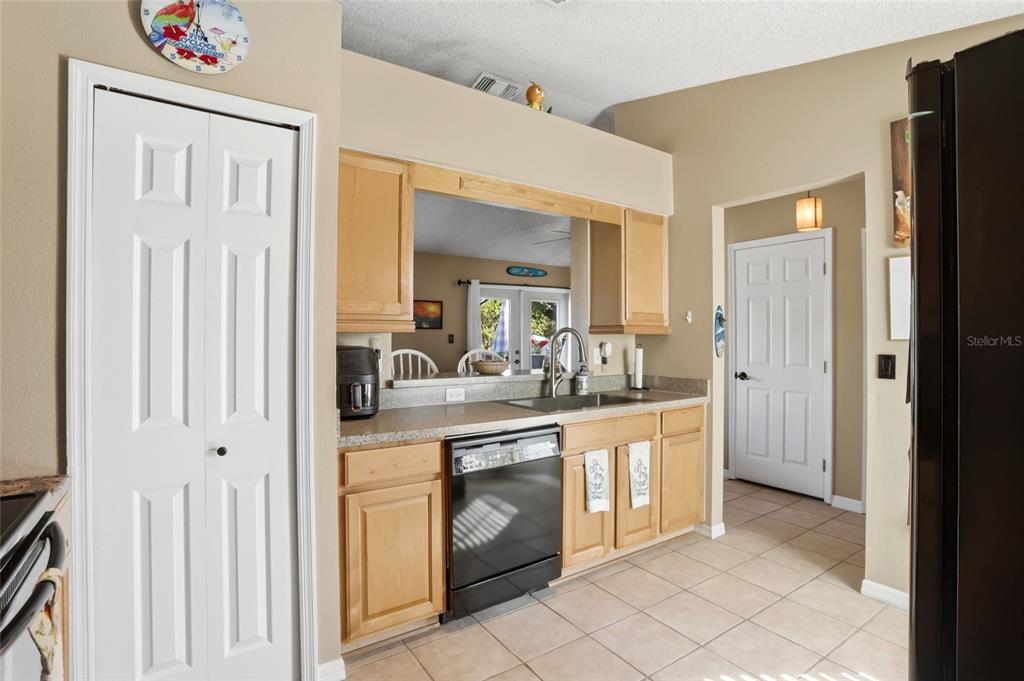 10735 Lake Ralph Drive Clermont, FL 34711 - Photo 13 of 37 a spacious bathroom with a granite countertop sink a mirror and a