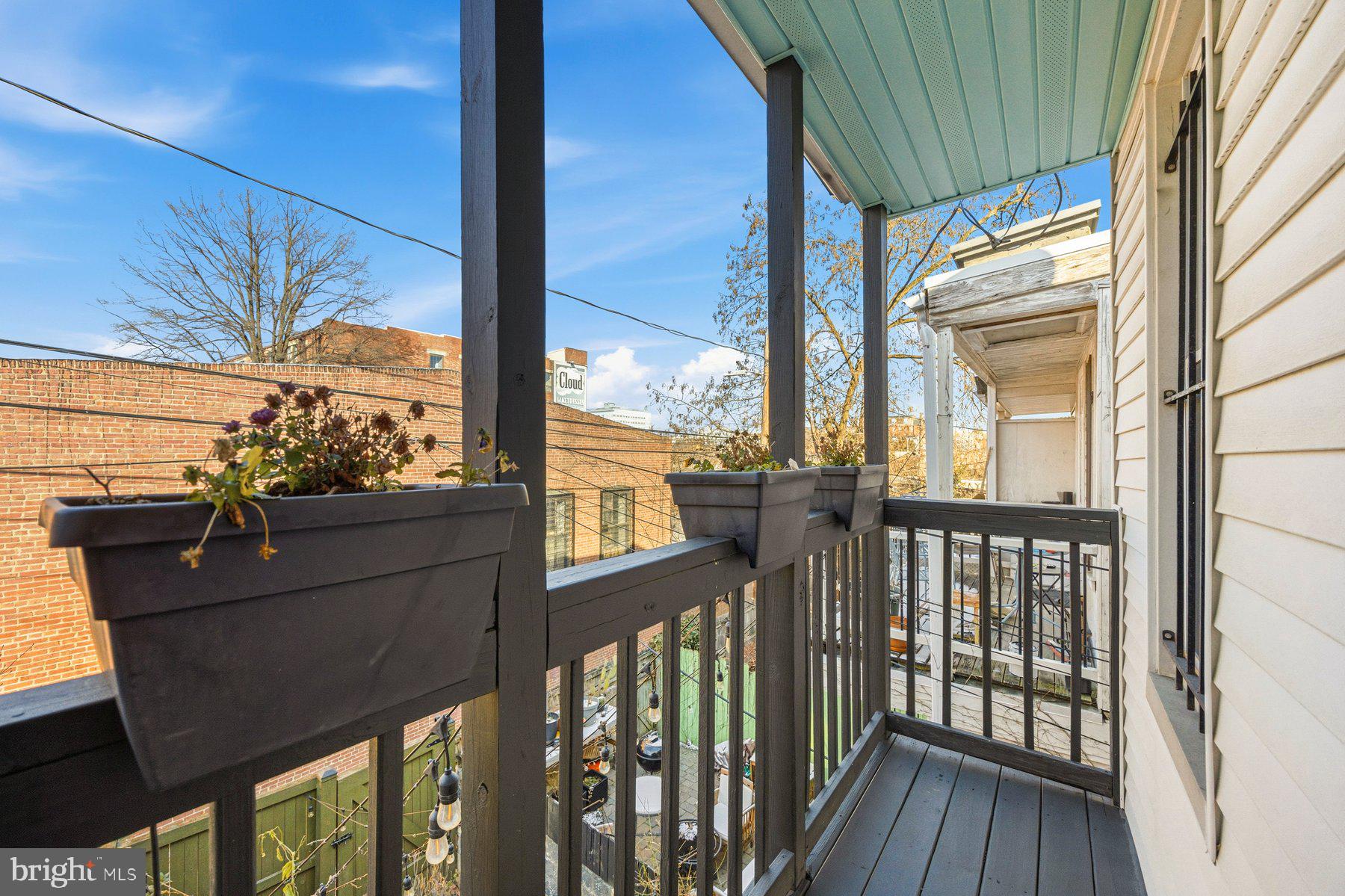 208 East Eager Street Baltimore, MD 21202 - Photo 22 of 31 a view of a balcony with wooden floor