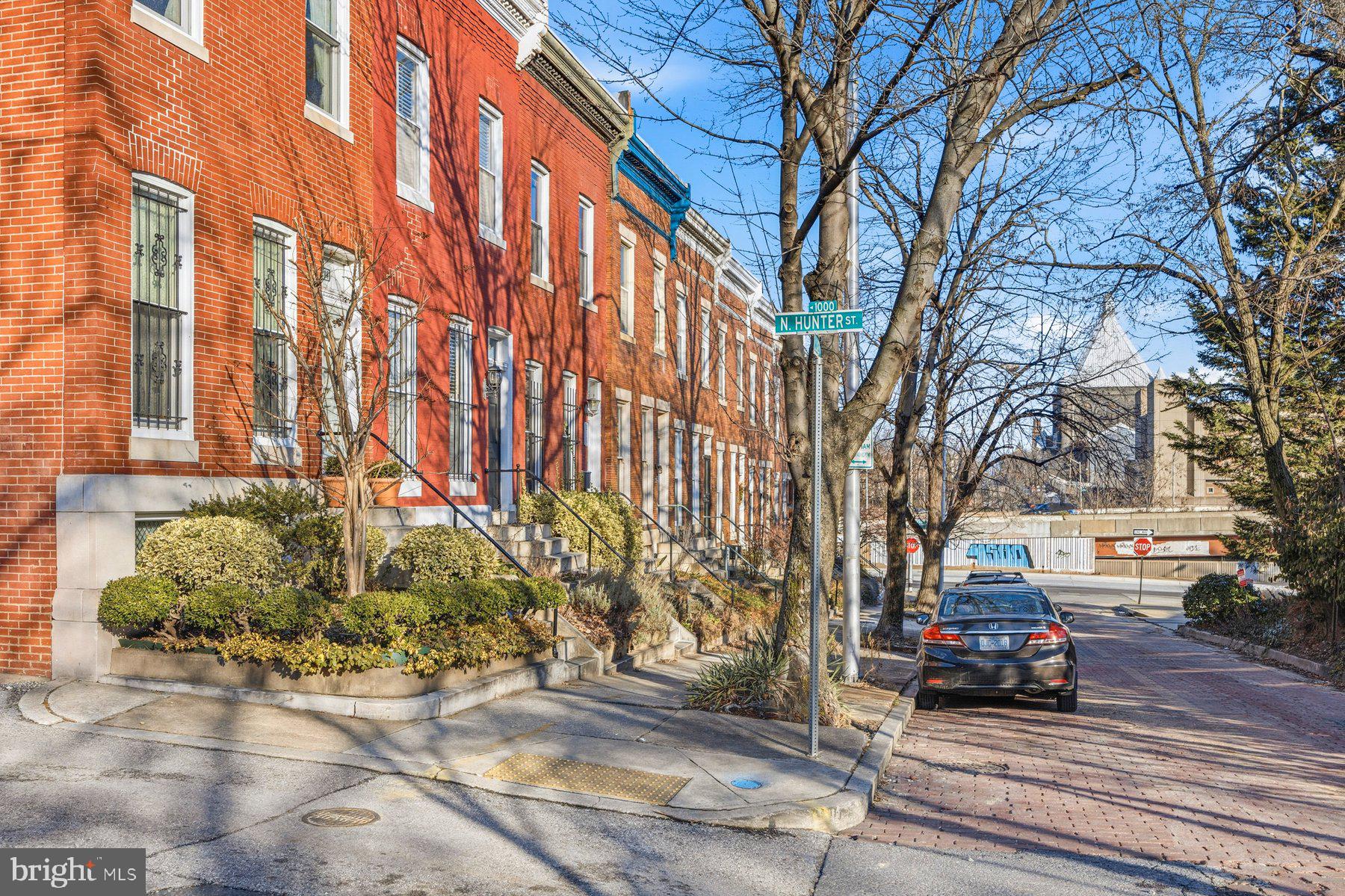 208 East Eager Street Baltimore, MD 21202 - Photo 29 of 31 a view of a building with car parked