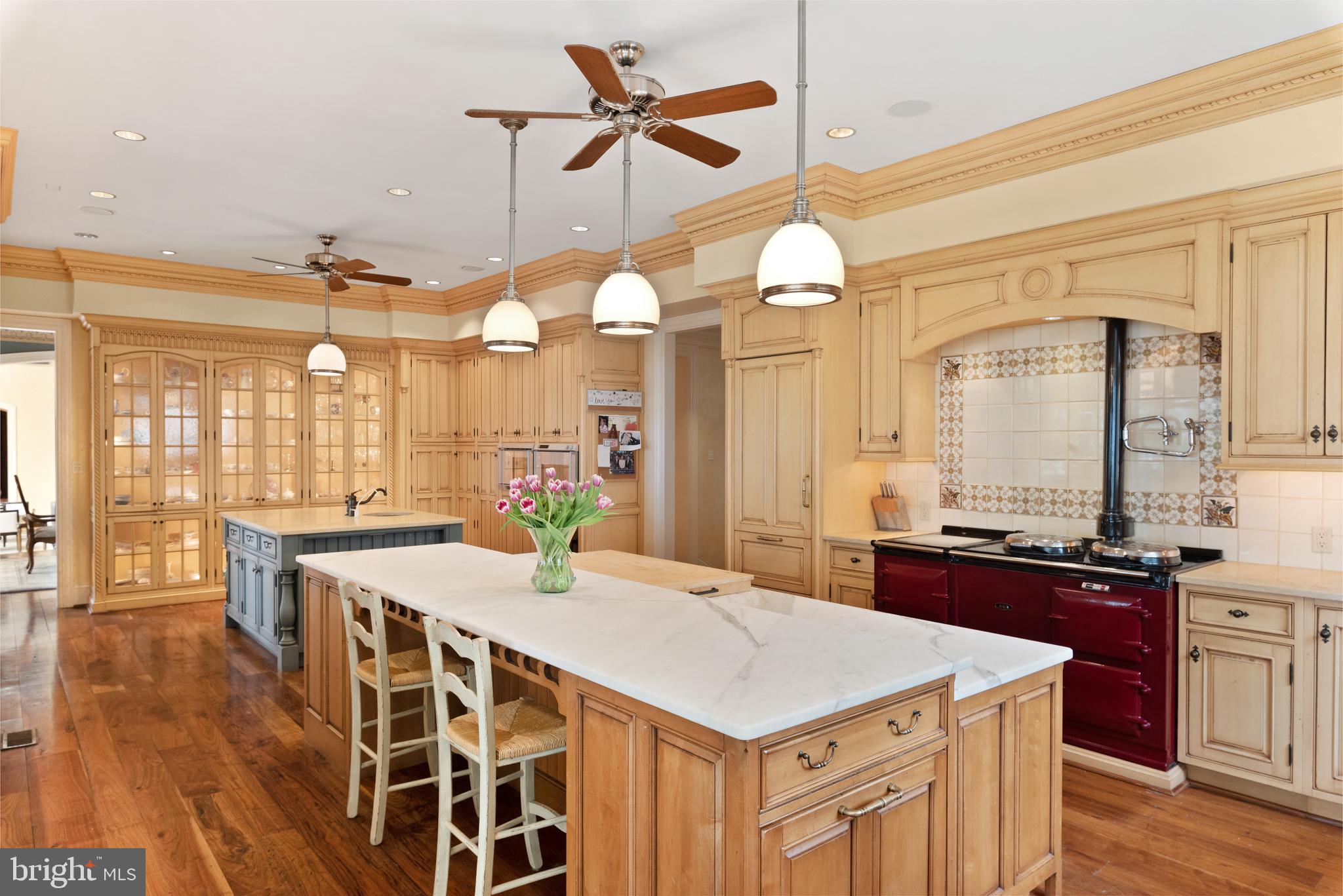 938 Old County Road Severna Park, MD 21146 - Photo 11 of 77 a large kitchen with a table and chairs