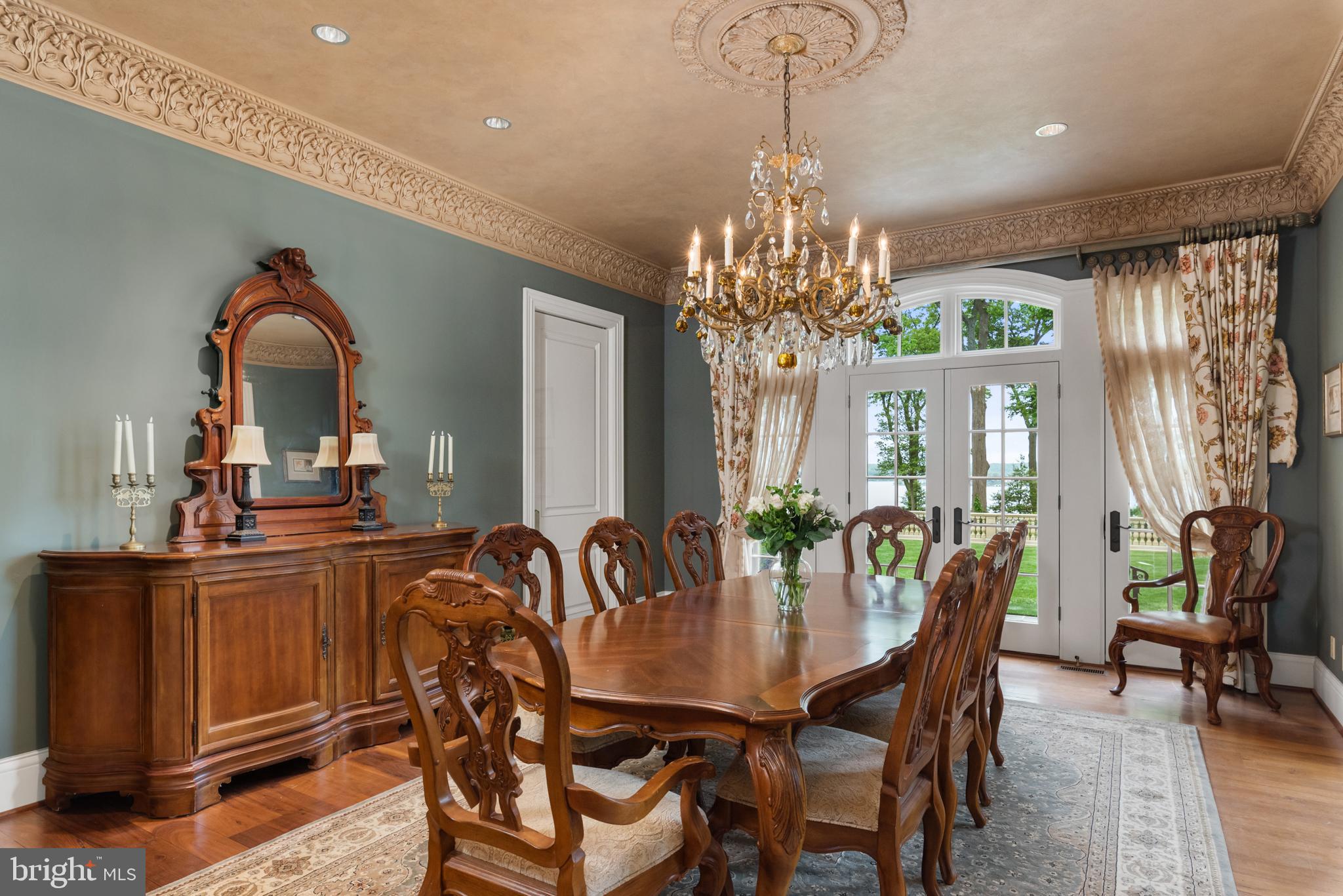 938 Old County Road Severna Park, MD 21146 - Photo 17 of 77 a view of a dining room with furniture and chandelier