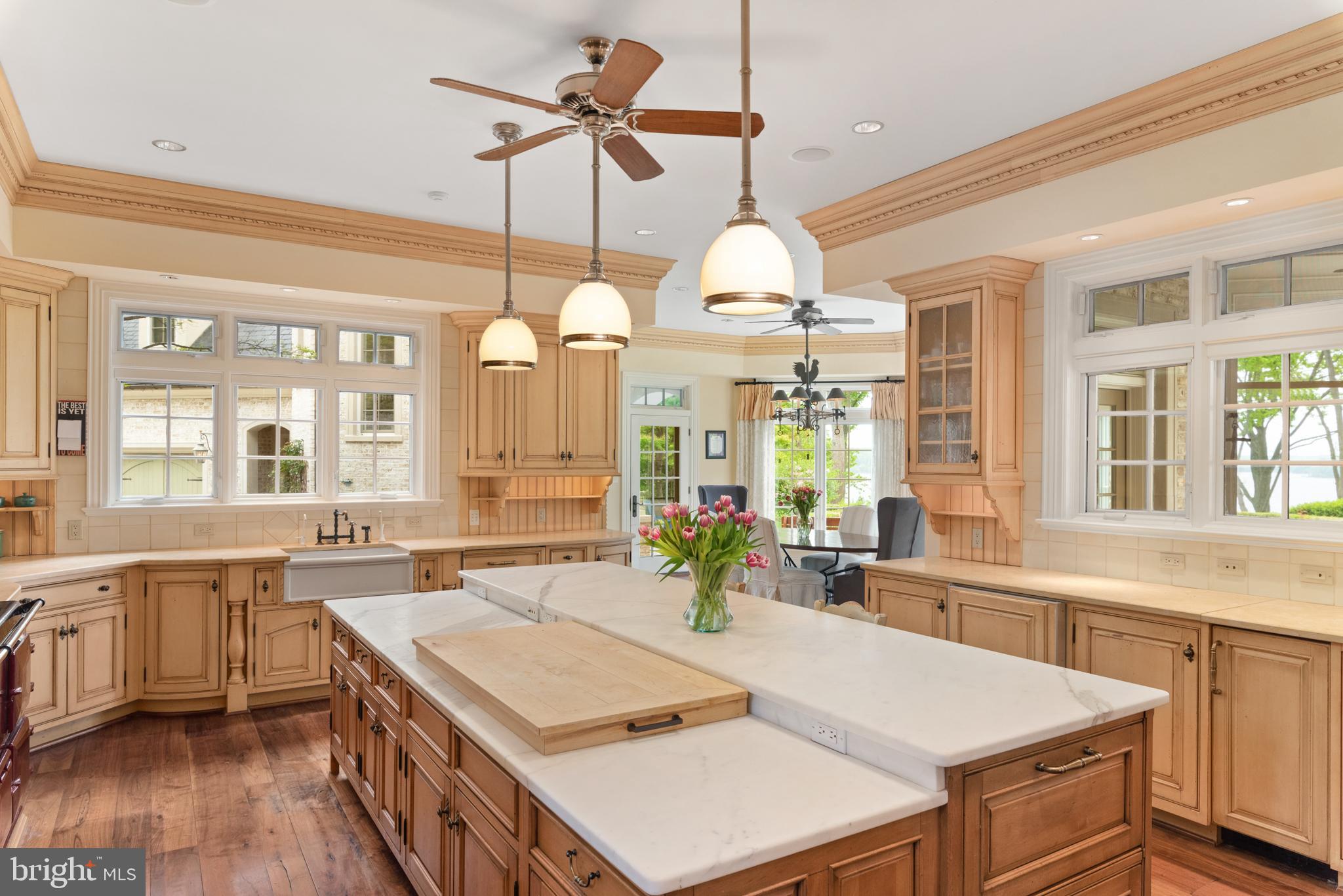 938 Old County Road Severna Park, MD 21146 - Photo 18 of 77 a large kitchen with a table and chairs