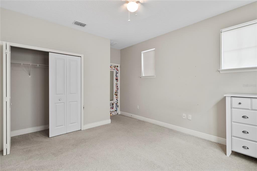 8764 Powder Ridge Trail Windermere, FL 34786 - Photo 20 of 43 a view of an empty room with a window