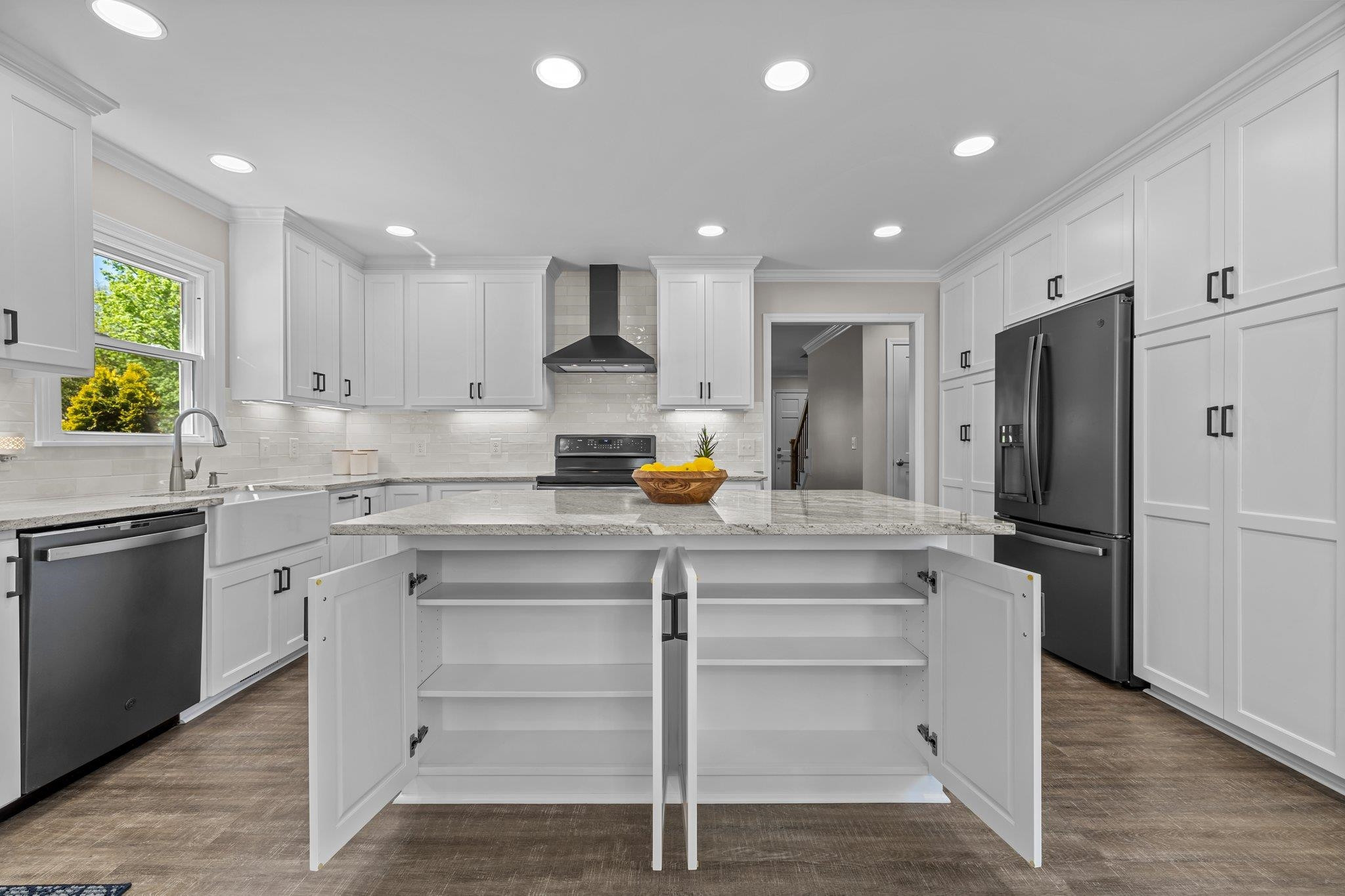 5229 Rivington Road Fuquay-Varina, NC 27526 - Photo 11 of 55 Great island with cookbook storage, easy stand mixer lift and pull out trash/recycling drawer. island
