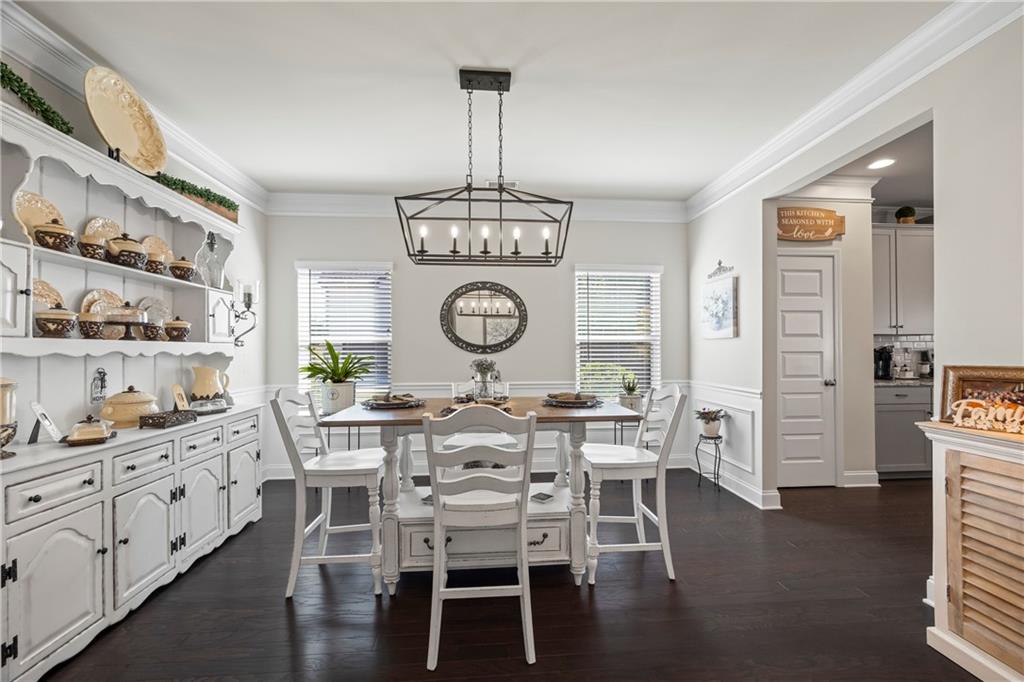 2347 Persimmon Chase Monroe, GA 30656 - Photo 25 of 85 a view of a dining room with furniture window and wooden floor