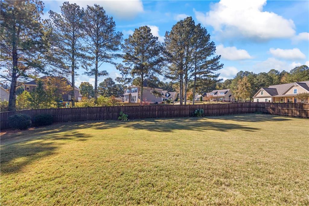 2347 Persimmon Chase Monroe, GA 30656 - Photo 52 of 85 a view of a swimming pool and an outdoor space