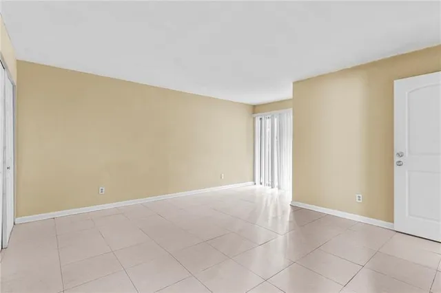 an empty room with a natural light