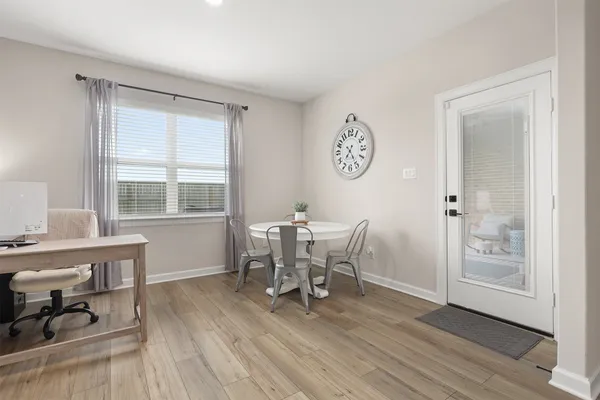 a workspace with wooden floor