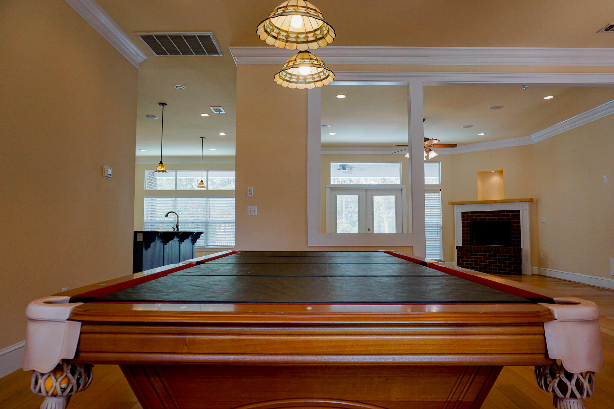 114 Eagle Drive Crestview, FL 32536 - Photo 11 of 63 a room with pool table and chandelier