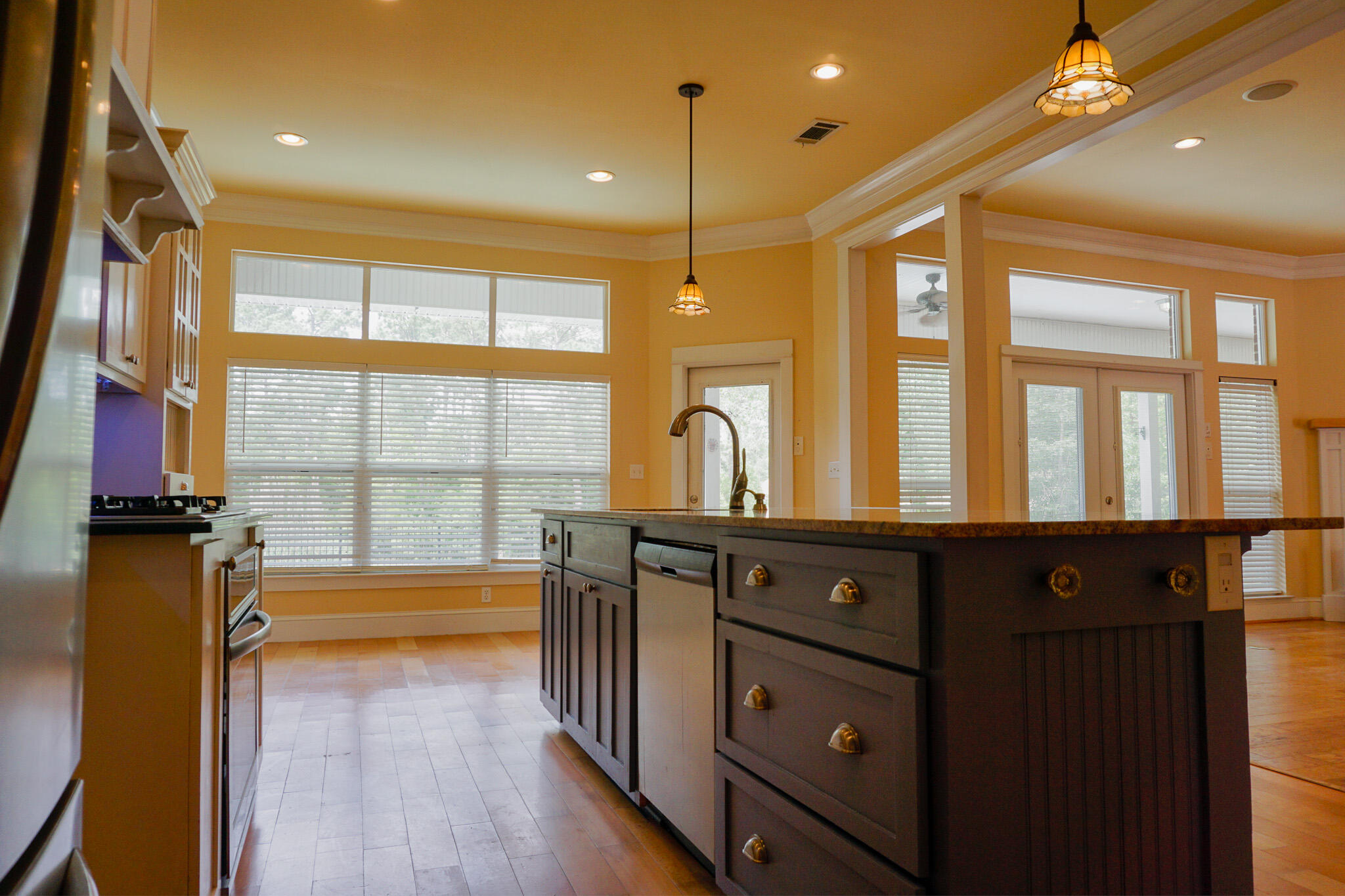 114 Eagle Drive Crestview, FL 32536 - Photo 15 of 63 a view of a bathroom with a large window and wooden floor